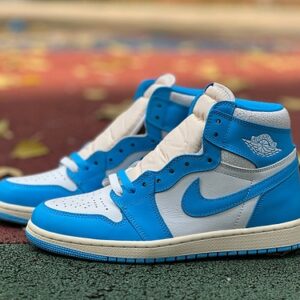 Air Jordan 1 Hi OG “UNC Reimagined” – Old North Carolina Blue –